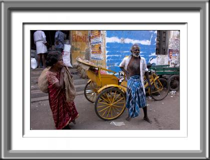 older man,India woman, rickshaw, pedicab