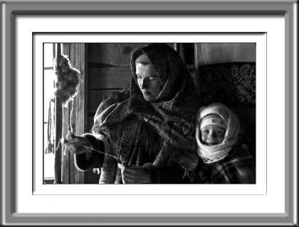 Spinning Madonna Spinning Wheel, Russia, mother, child, black and white, Kizhi Island